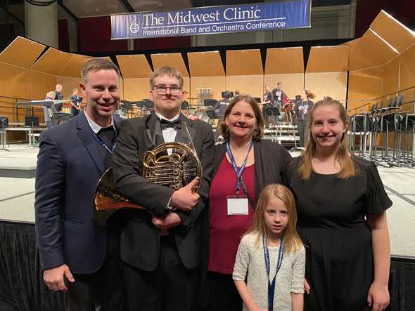 Isaac and Alexis perform with the Berkner Symphonic I Band at Midwest in Chicago, IL in December 2019